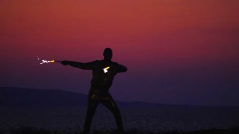 Fire show amazing at night. Fire dancers Swing fire dancing show fire show 库存影片 132734977