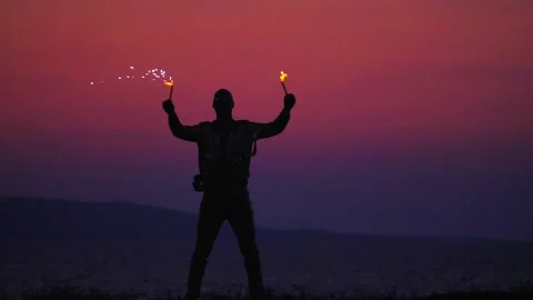 Fire show amazing at night. Fire dancers Swing fire dancing show fire show Stock Footage 132736306