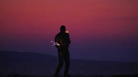 Fire show amazing at night. Fire dancers fire dancing show fire show beach Stock Footage 132736615