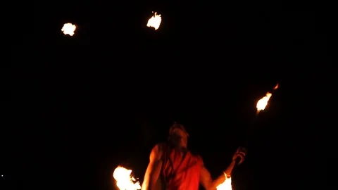 Fire show on the beach performed by a hot guy. Stock Footage 96210547