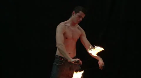 Fire show on black background Stock Footage 18192304