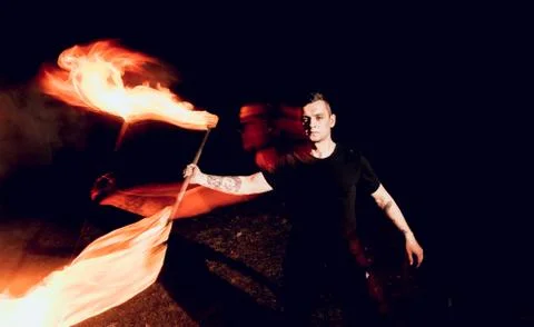 Fire show. Fire performance at the night. Stock Photos