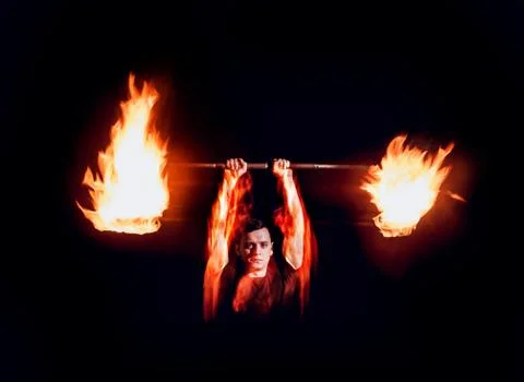 Fire show. Fire performance at the night. Stock Photos