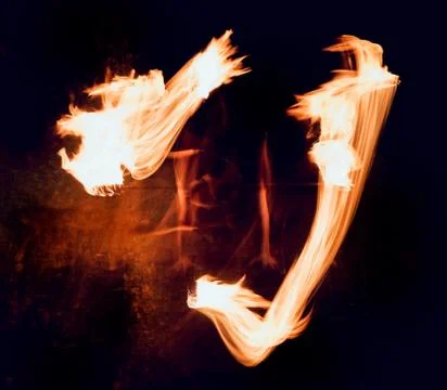 Fire show. Fire performance at the night. Stock Photos