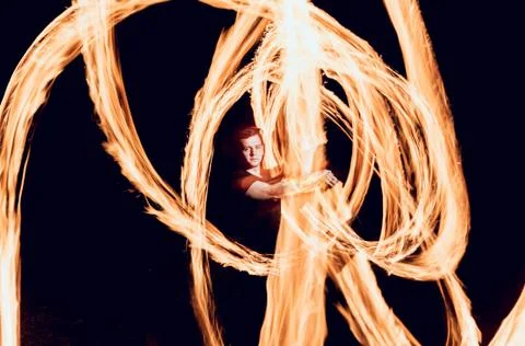 Fire show. Fire performance at the night. Stock Photos