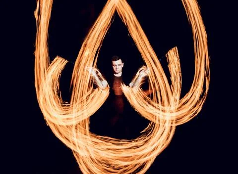 Fire show. Fire performance at the night. Stock Photos