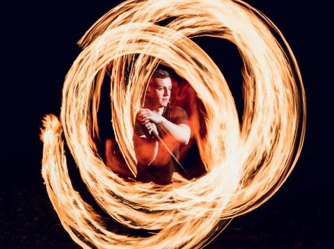 Fire show. Fire performance at the night. Stock Photos