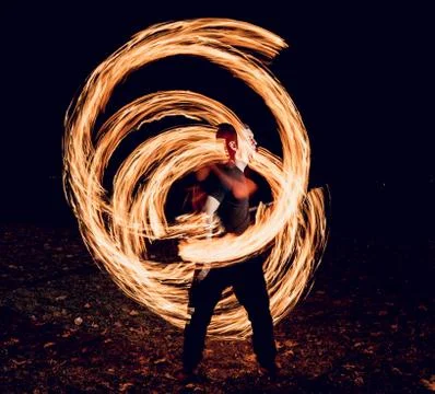 Fire show. Fire performance at the night. Stock Photos