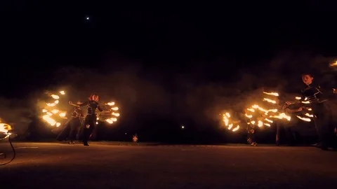 Fire show. A group of professional artists performs a variety of fire facilities Stock Footage