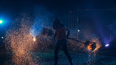 Fire Show. Guy Twists In His Hands Stick From Which Many Sparks Of Fire Go Out. Stock Footage 109458405