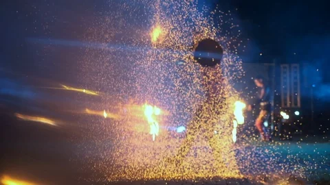 Fire Show. Guy Twists In His Hands Stick From Which Many Sparks Of Fire Go Out. Stock Footage 109458420