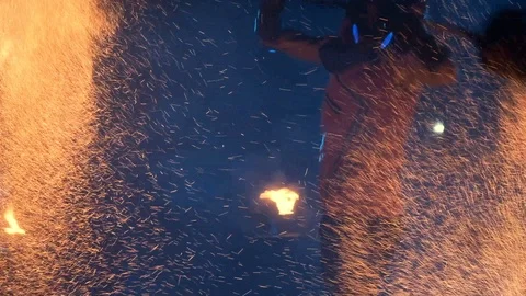 Fire Show. Guy Twists In His Hands Stick From Which Many Sparks Of Fire Go Out. Stock-Footage 109458453
