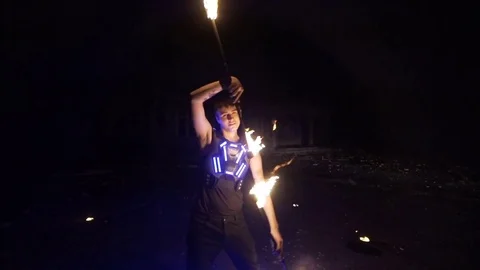 Fire show. Man juggling fire. Stock Footage 82608561