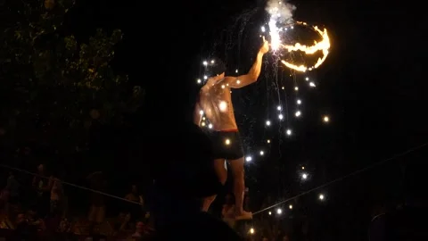 Fire show, man performing tricks with fire Stock Footage 275326770