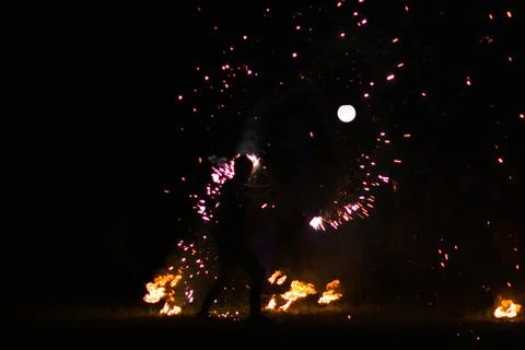 Fire show in the night Stock Photos
