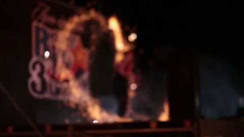 Fire show performer spinning fireworks at night. Video stock 77233166