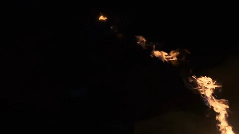 Fire show performers create a lot of flame with flamethrower. Artists light up Stock Footage 120691245