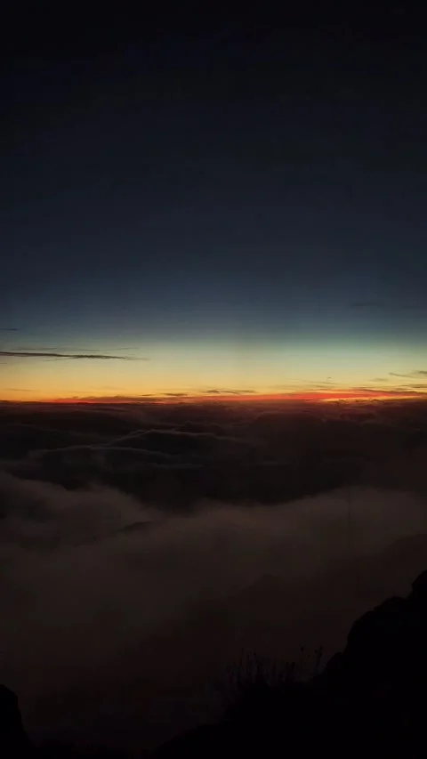 Fire sky above the clouds Stock Footage 320501091