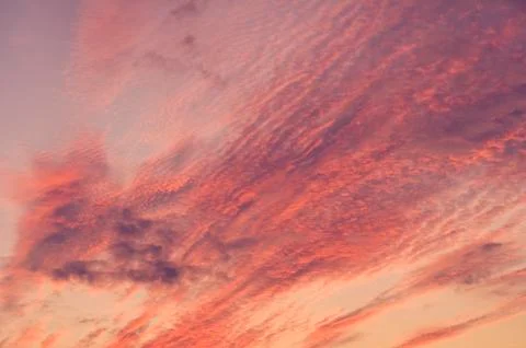 Fire sky background. Soft clouds with the hint of the sun at sunset. 스톡 사진