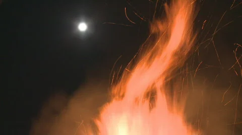 Fire, slow shutter flames and the moon Stock Footage 853832
