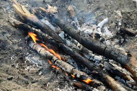 A fire with a small flame of fire Stock Photos