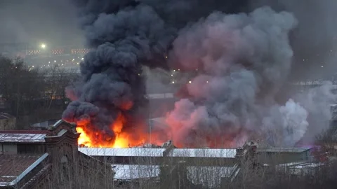 Fire smog filled cityscape with air pollution looming over suburban area. Arson Stock Footage 296091789
