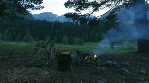 Fire with smoke evening in mountain forest Video stock 68356745