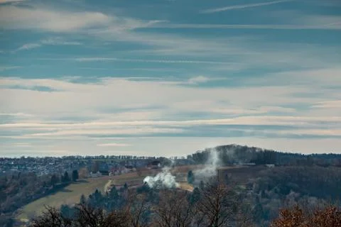 A fire somewhere on the field or in the forest near the village Stock Photos