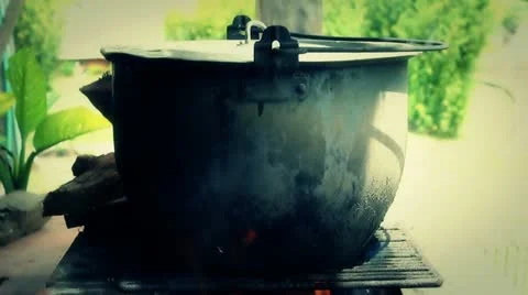 Fire soup pot 01 Stock Footage 20605740