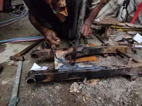 Fire sparkle generates due to welding work. Stock Photos