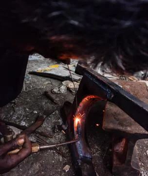 Fire sparkle generates due to welding work. Stock Photos