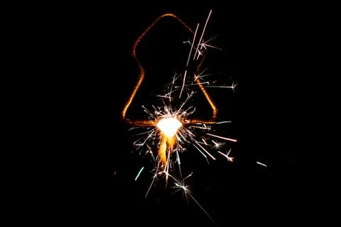 Fire sparklers on black background Stock Photos