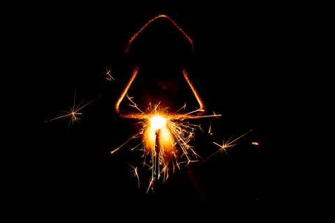 Fire sparklers on black background Stock Photos