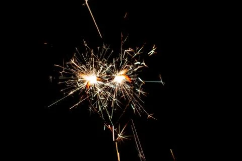 Fire sparklers on black background Stock Photos