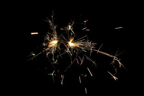 Fire sparklers on black background Stock Photos