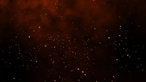 Fire sparks dust flying slowly rising up background. 库存影片 336859601
