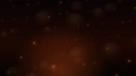 Fire sparks floating in dark space creating warm atmosphere Stock Footage 336994269