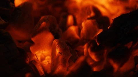 Fire sparks moving on dark at black background coming from brightly burning warm 動画素材 89799327