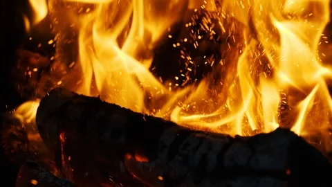 Fire sparks moving on dark at black background coming from brightly burning warm 動画素材 89800703