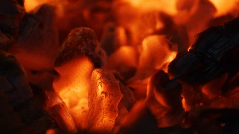 Fire sparks moving on dark at black background coming from brightly burning warm 스톡 동영상 94421314