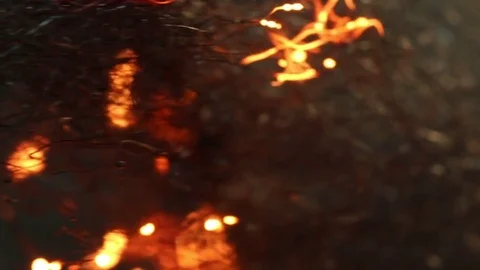 Fire Sparks Raining Down Close-Up MAC Stock Footage 74535166
