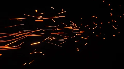 Fire sparks shoot from left to right in 4K Stock-Footage 93517501