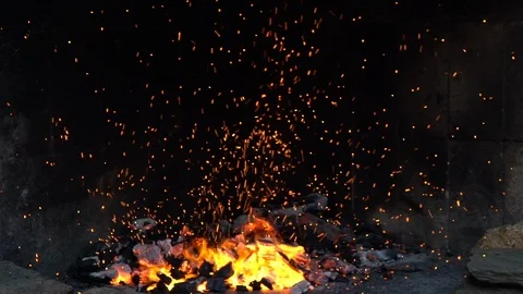 Fire sparks from the wood burning in the... | Stock Video | Pond5