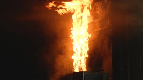 Fire spread from microwave to wall and go to ceiling in kitchen in house Stock Footage 156978428