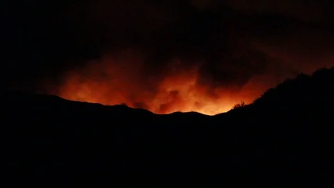 A Fire starts in the mountains Stock Footage 109208760