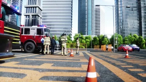 Fire station. A firefighter stands next to a fire engine. Stock Footage 333418675