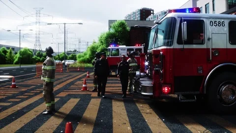 Fire station. A firefighter stands next to a fire engine. Stock Footage 333418687