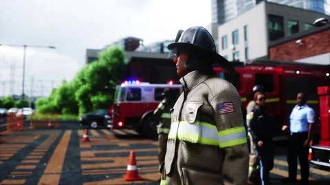 Fire station. A firefighter stands next to a fire engine. Stock-Footage 333418710