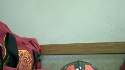 Fire Station Gear - Pan of Rows Video stock 12600339