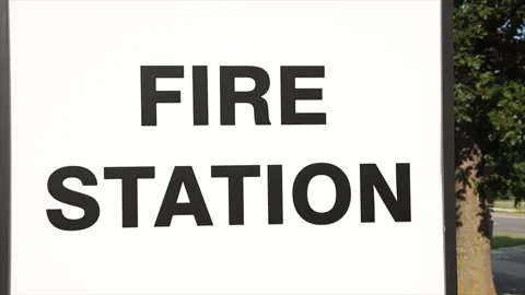 Fire station sign writing caption text words in black on white background Stock Footage 249420869